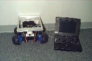 Robot next to Computer